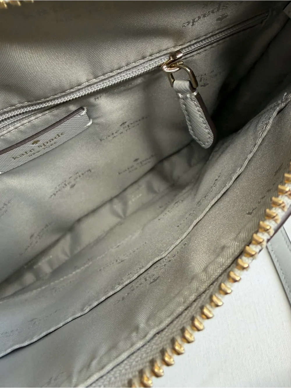kate spade light gray saffiano leather messenger bag with gold hardware
